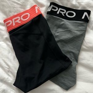 2 pairs of Nike Pros with two booty bands (: